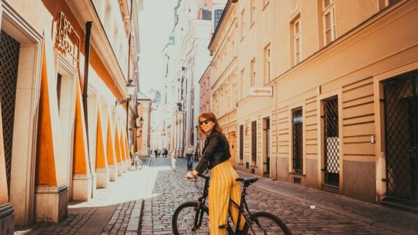 woman riding black hardtail bike